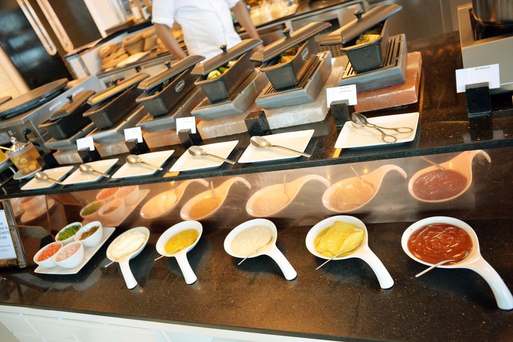 The Domain Bahrain Hotel And Spa - Adults Friendly 16 Years Plus Manama Exterior photo A selection of sauces